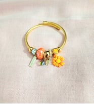 kadın papatya figürlü çelik pandora (Turuncu)