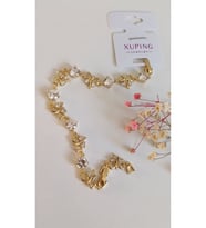 BİLEKLİK ÇELİK XUPİNG XO 14 AYAR GOLD ROSE RENK VİP SERİ 1 YIL RENK GARANTİLİ