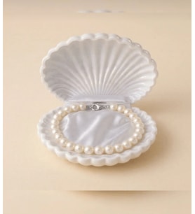 LUX KREM RENK İNCİ BİLEKLİK İSTİRİDYE KUTU İÇERİSİNDE KOKULU LOTUS MUM İSTİRİDYE