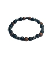 JTAW25BLK1644 8 MM MAZI AĞACI ONYX ve HEMATİT DOĞALTAŞ ESNEK SİYAH GARANTİLİ JANTİ BİLEKLİK