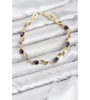 Pirinç Gold Renk Mor Zirkon Taşlı Çiçek Model Kadın Bileklik TJ-BB8583