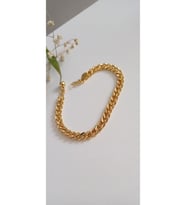 ÇELİK BİLEKLİK XUPİNG SİMLİ ALTIN  KAPLAMA ARPA 22 AYAR GOLD RENK GARANTİLİ KUYUMCU MODEL