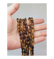 Bileklik Boy Kaplangözü Taşı Arpa Kesim Yarım Dizi 6*8.5mm (49972) (18CM UZUNLUĞUNDADIR)