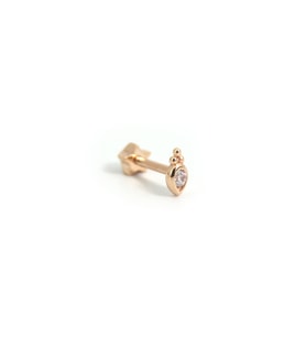 altın tragus helix piercin