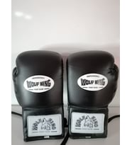 Wolfking marka Deri Boks Eldiveni siyah renk ipli model Orjinal Dana derisidir. 10-12-14-16oz büyüklükte İstediğiniz Bedeni msj ile bildiriniz