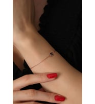 925 Ayar Gümüş Rose Kaplama Mavi Zirkon Taşlı Yarım Göz Gümüş Bileklik