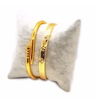 Altın Renk Çivi Ve Taşlı Cartier Model Bileklik Set 943