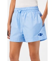 Lacoste x Netflix Women's Monogram Bermuda Shorts Kadın Monogram Hafif Kumaş Bermuda Şort Açık Mavi