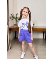 Kız Çocuk Üzerinde Digital Kurdela Basklı T-Shirt ve Fiyonk Cep Detaylı Lila Şor