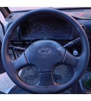 DİKİŞLİ DİREKSİYON KILIFI SİYAH DERİ SİYAH DİKİŞLİ HYUNDAİ H100 İÇİN