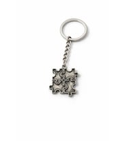 Puzzle Parça Motifli Gümüş Renk Metal Unisex Anahtarlık – Sembolik Tasarım