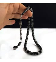 ZİRKON TAŞLI PÜSKÜLLÜ GÜMÜŞ İŞLEME KAPSÜL ATEŞ KEHRİBAR TESBİH (Siyah)