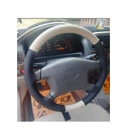 DİKİŞLİ DİREKSİYON KILIFI BEJ/SİYAH DERİ SİYAH DİKİŞLİ TOYOTA COROLLA İÇİN HIZLI KARGO