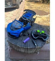 1:14 Ölçek Full Fonksiyonlu Şarjlı Işıklı Uzaktan Kumandalı Kapıları Açılır Bugatti Spor Araba 28 Cm