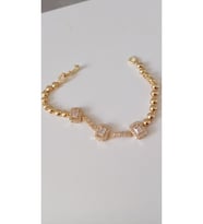 ÇELİK BİLEKLİK KADIN 14 AYAR GOLD RENGİNDE SURİYE ALTIN KAPLAMA ANTİALERJİK KARARMAZ 17 CM