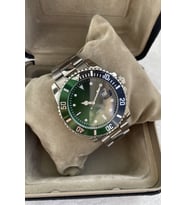 Özel Kutulu Takvimli Erkek Kol Saati Rolex Model Özel Seri En Çok Satan Moda Gümüş Renk Hediyelik Abi Abla Baba Erkek Nişanlı Koca Kardeşe Eşe Sözlüye Kuzen Yıldönümü Doğum Günü Hediyesi Hediye Siyah Yeşil Sakaryaspor Tatanga Renk
