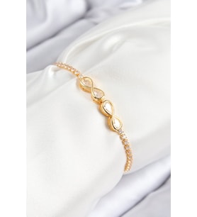 Pirinç Zirkon Taşlı Sonsuzluk Model Gold Renk Asansörlü Kadın Bileklik - TJ-BB7721