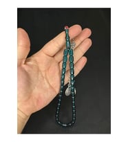 ATEŞ KEHRİBAR TESBİH KOYU YEŞİL RENKLİ KAPSÜL KESİM 11MMX8MM