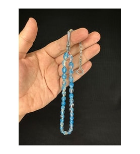 TOZ KEHRİBAR TESBİH MAVİ RENKLİ BEYZİ KESİM 10MMX6,5MM T-680