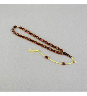 Omari Ateş Kehribar Kapsül Kesim Oturtma İmameli Sistemli 7.5x10mm Tesbih
