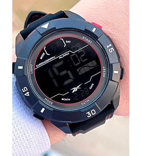 Reebok Silikon Kordon 50 Mt Suya Dayanıklı Dijital Seri Büyük Kasa Spor Erkek Kol Saati RV.PBIG-BG02 (Siyah)