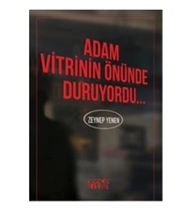 Adam Vitrinin Önünde Duruyordu