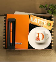 Kişiye Özel Termo Deri Turuncu Defter & Kişiye Özel Turuncu Metal Roller Kalem & Harf Baskılı Fincan & Kahve Dünyası Özel Seri Cappuccino Hediye Seti