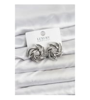 Mey İthalat® Gümüş Renk Pirinç Keskin Sarmal Model Kadın Küpe