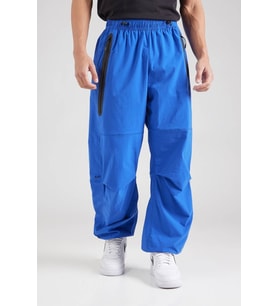 Nike Tech Woven Oversized Pants Flat Pewter Paraşüt Kumaş Erkek Oversize Bol Kesim Eşofman Altı Sax Mavi