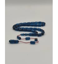 USTA İŞCİLİKLİ MAVİ  ATEŞ  KEHRİBAR TESBİH 8 * 12  MM KAPSÜL KESİM TAKIMLI SİSTEMLİ