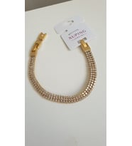 ÇELİK BİLEKLİK XUPİNG SU YOLU ÜÇ SIRA 14 AYAR GOLD RENGİNDE SAVOROSKİ TAŞLI 17+2 CM FMACCESORİES