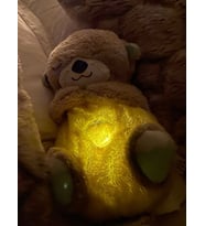 Nefes alan su samuru uyku arkadaşı sesli müzikli peluş karışık renktir