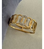 Kadınlar İçin Altın Kaplama Zirkon Taşlı Gold Renk İç İçe Geçme Halka Modeli Çelik Bileklik (Altın Rengi)