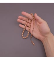 Beyaz Plesenk Ağacı Usta İşi İmzalı Kapsül Kesim 6.5x11.5mm Tesbih