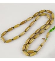 Sıkma Kehribar Uzun Arpa Kesim 6.5x18mm Tesbih - Hardal Sarısı