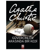GÜVERCİNLER ARASINDA BİR KEDİ
