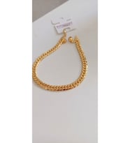 ÇELİK BİLEKLİK XUPİNG SİMLİ ALTIN  KAPLAMA ARPA 22 AYAR GOLD RENK GARANTİLİ KUYUMCU MODEL