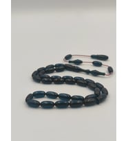 USTA İŞCİLİKLİ MAVİ  ATEŞ  KEHRİBAR TESBİH 7 * 11  MM ARPA KESİM TAKIMLI SİSTEMLİ
