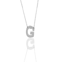 Söğütlü Silver Gümüş rodyumlu üç boyutlu minimal G harf kolye