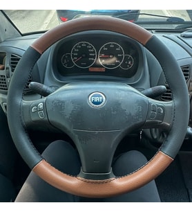 DİKİŞLİ DİREKSİYON KILIFI TABA / SİYAH DERİ SİYAH DİKİŞLİ Fİ.AT DUCATO 2 İÇİN