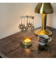 Isı İle Dönen Mumluk – Güneş Desenli Şık Dekoratif Mumluk (Gold)