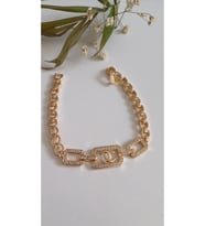 ÇELİK BİLEKLİK  MARKA ALTIN KAPLAMA DORİKA 14 AYAR GOLD RENK GARANTİLİ KUYUMCU MODEL 18 CM