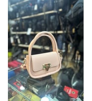 TRG Polo Kadın Soft Deri Mini Gold Kapamalı Çapraz Omuz ve El Çantası (Pembe)