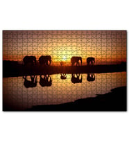 Cakapuzzle Günbatımında Nehir Kenarındaki Fil Ailesi  Puzzle Yapboz MDF (Ahşap) (1000 Parça)